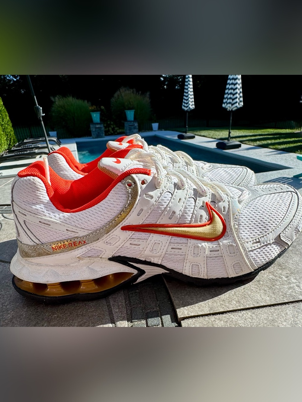 NWOT! Nike Women's White Running Shoes with Gold Swoosh and Red Accents